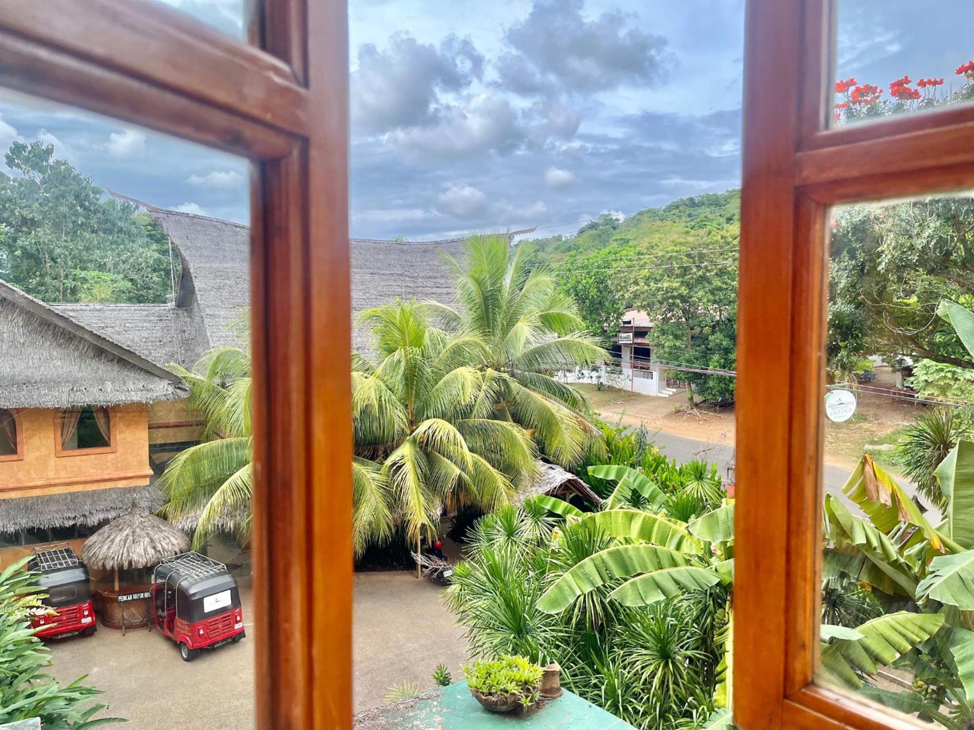 Coco Grove Beach Resort, Siquijor Island Cameră foto View from the window of a guest house in the village of Kumburupiddy